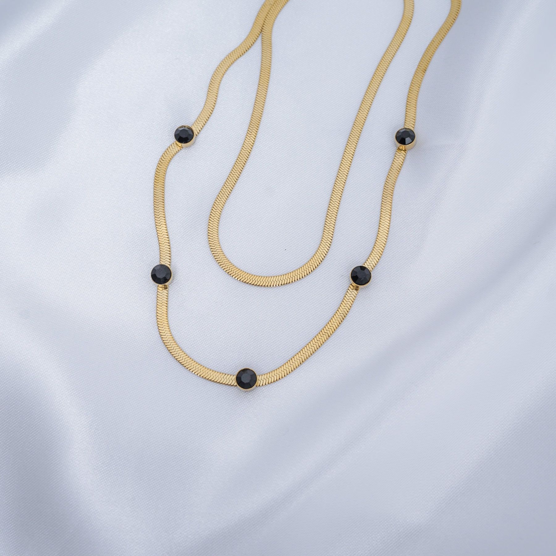 CASSANDRA DOUBLE NECKLACE - GOLD & BLACK ' - ' CHAINS