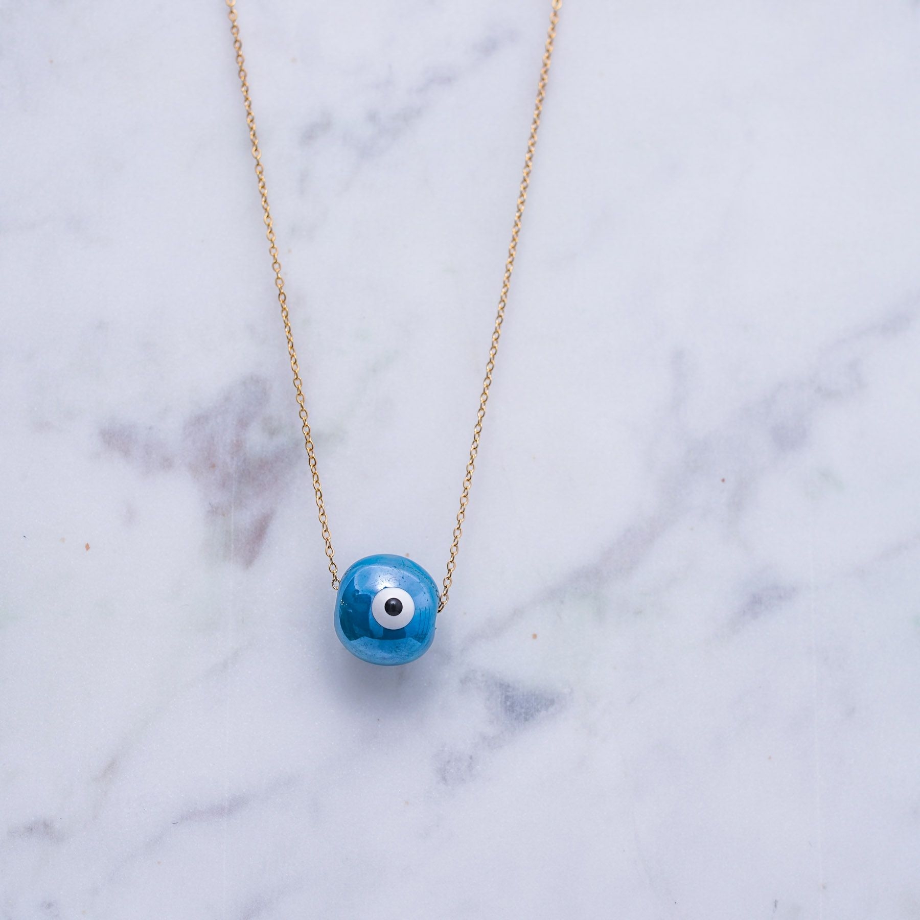 SPHAIRA CHARM NECKLACE - GOLD & PEARL BLUE ' - ' ΚΥΒΟΙ