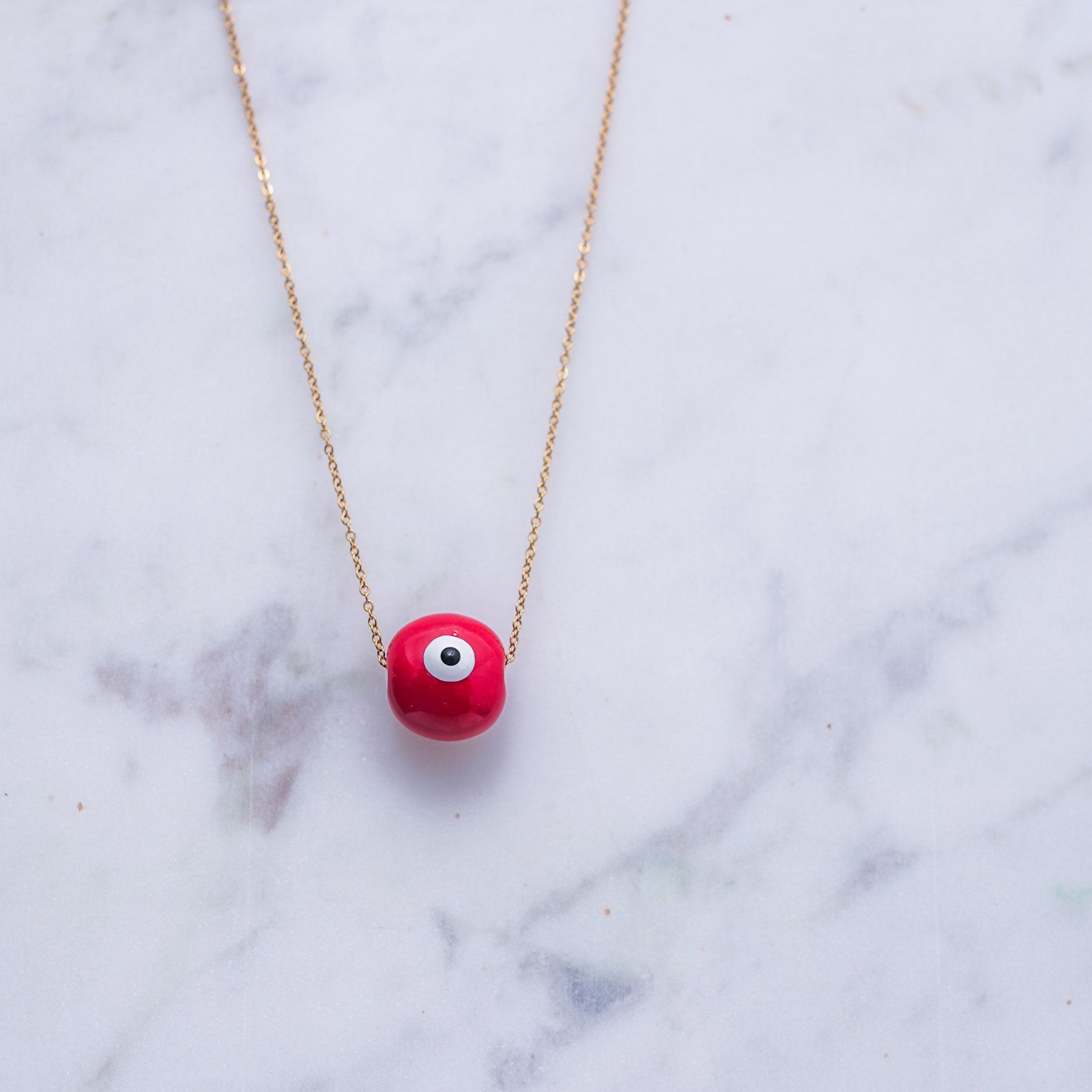 SPHAIRA CHARM NECKLACE - GOLD & RED ' - ' ΚΥΒΟΙ